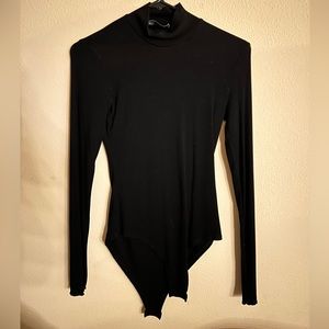 Brand new Cider long sleeve, black body suit. Never worn